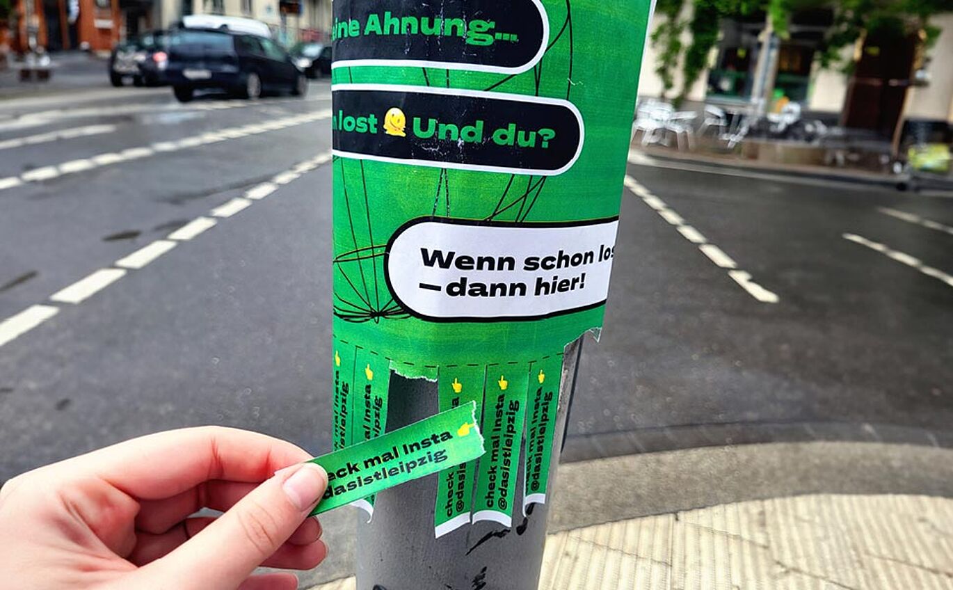Culture campaign tear-off label on lamppost