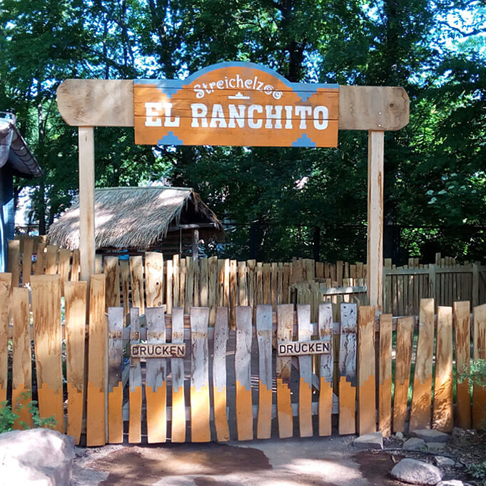 Signage for the El Ranchuto petting zoo as part of the exhibition design. 