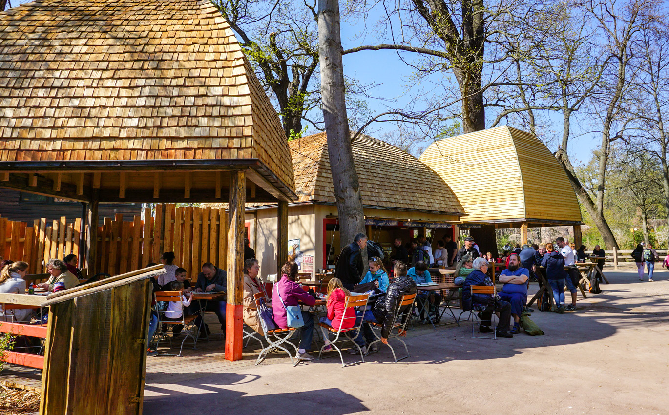 Three wooden shelters as part of the completed scenery construction 