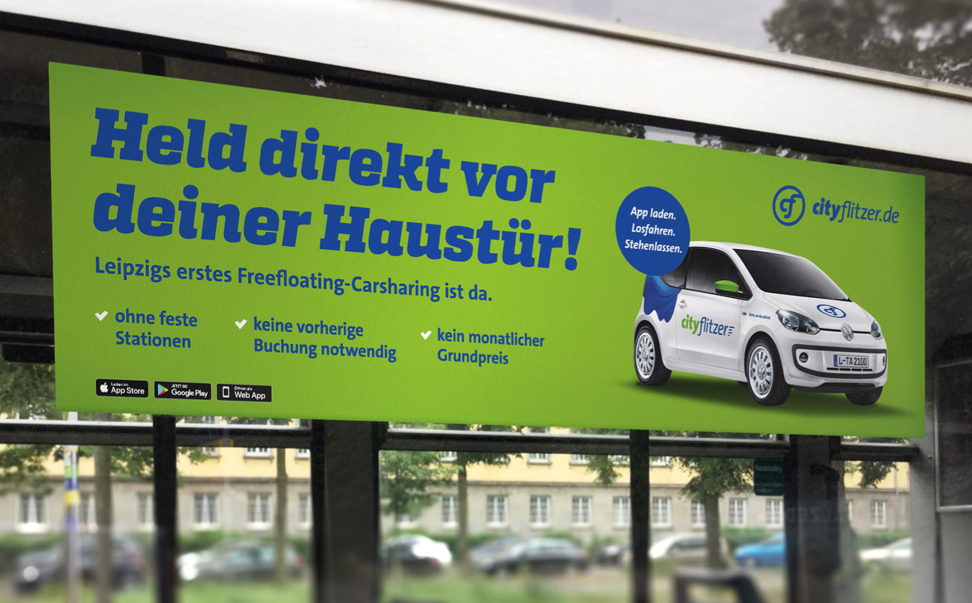 ÖPNV Werbung Plakatgestaltung im Corporate Design von cityflitzer an einer Straßenbahn